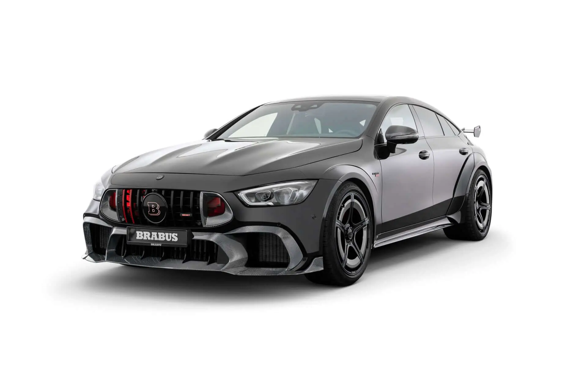 Brabus Rocket 1000 widebody four-door in gloss black, front three-quarter studio view