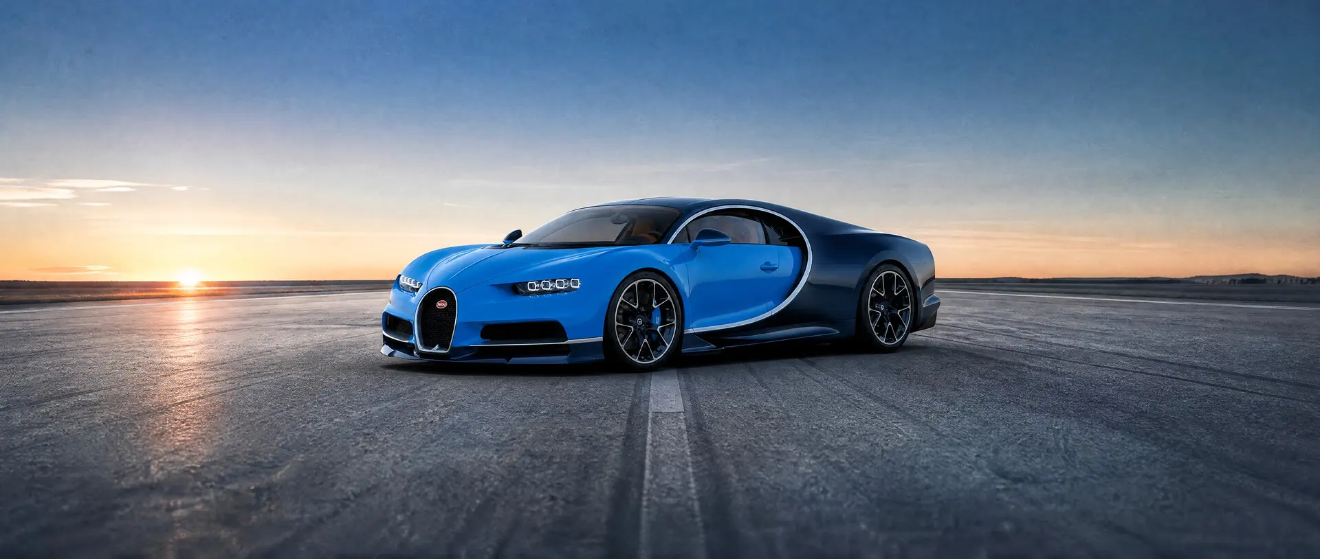 A blue Bugatti Chiron Super Sport on a deep blue studio field.