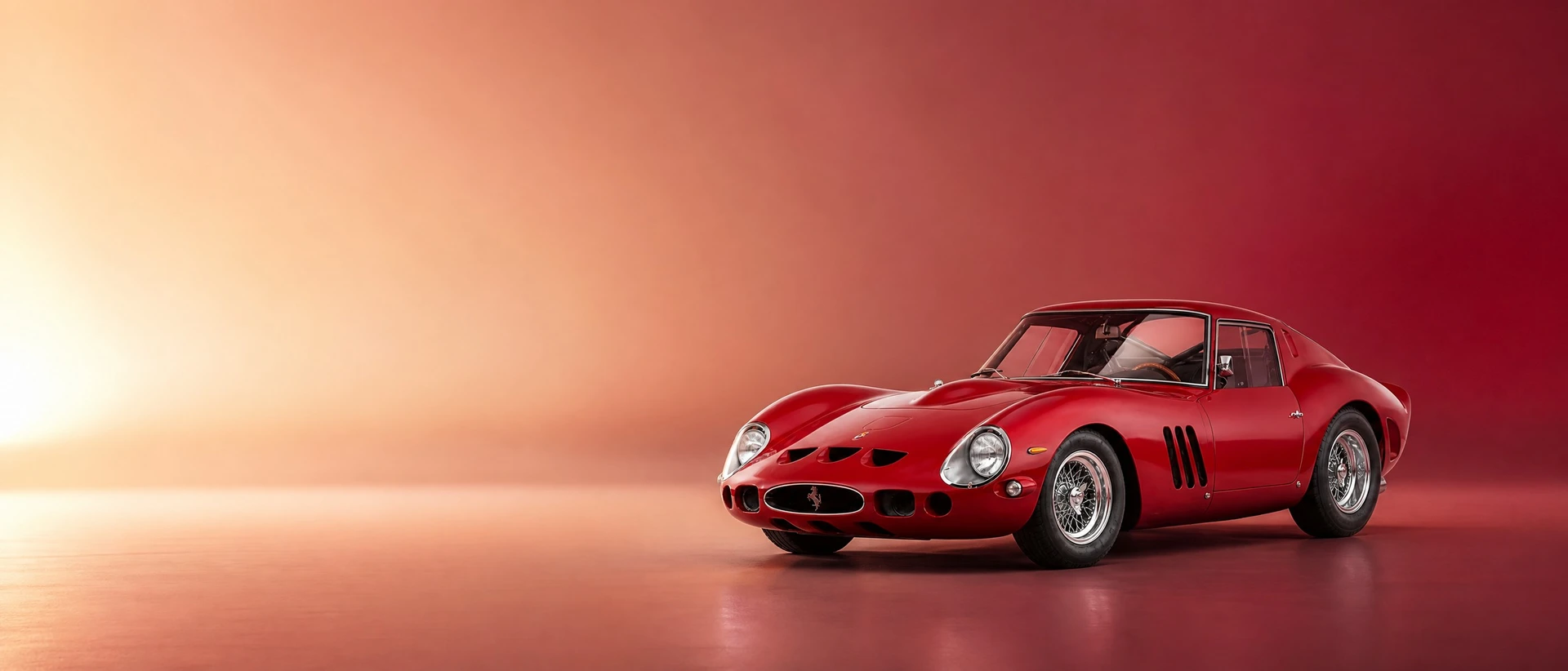 A red Ferrari 250 GTO, front three-quarter view on a gold-burgundy field with sunrise glow