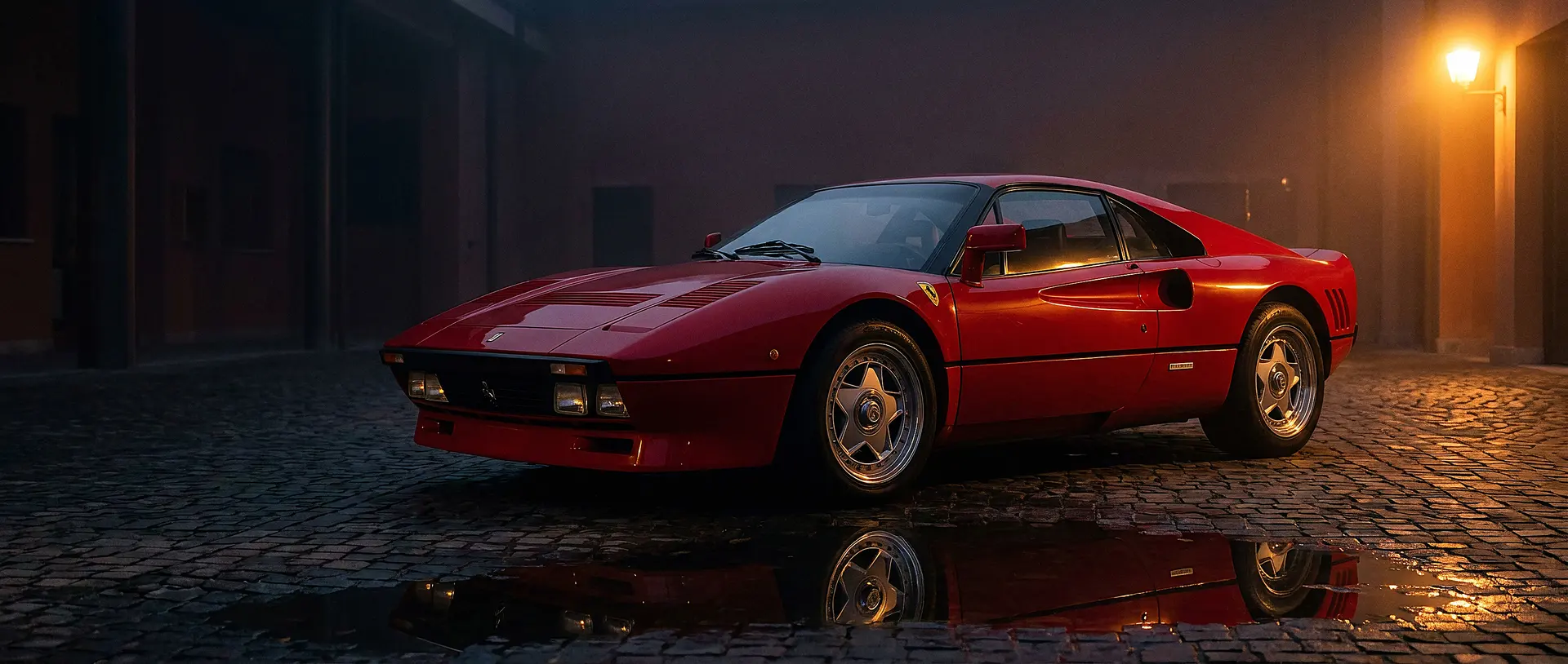 Red Ferrari 288 GTO with raised pop-up headlights in front-three-quarter view at an outdoor radome facility.
