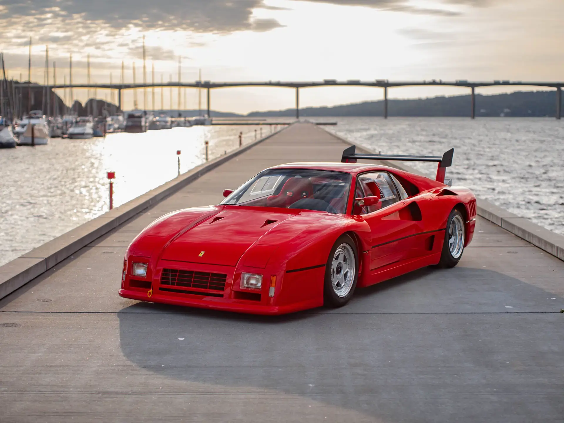 GTO Evoluzione chassis 79888 at a marina, front three-quarter view
