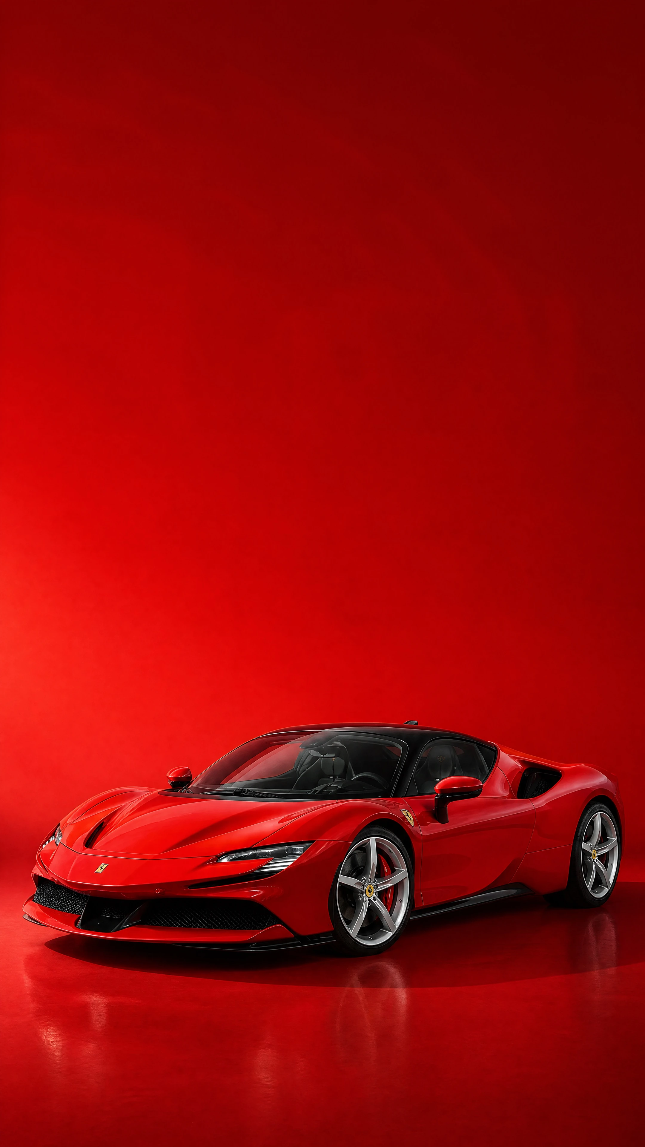 A Rosso Corsa Ferrari SF90 Stradale, front three-quarter view on a deep red field in warm daylight