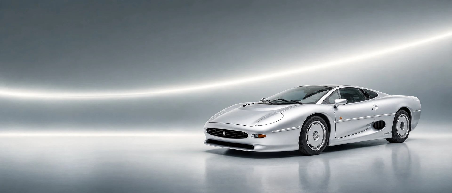 A Spa Silver Jaguar XJ220, front three-quarter view on a silver-teal field with a curved light band