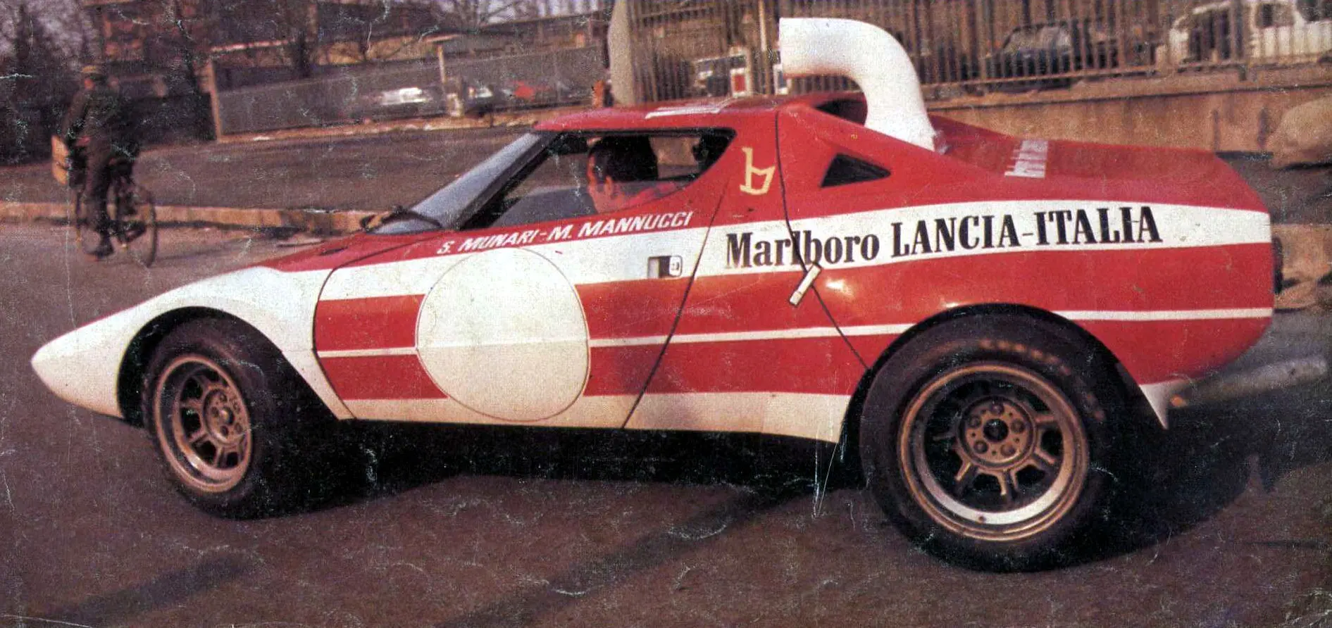 Marlboro-liveried Stratos prototype in side profile, with a driver visible through the window