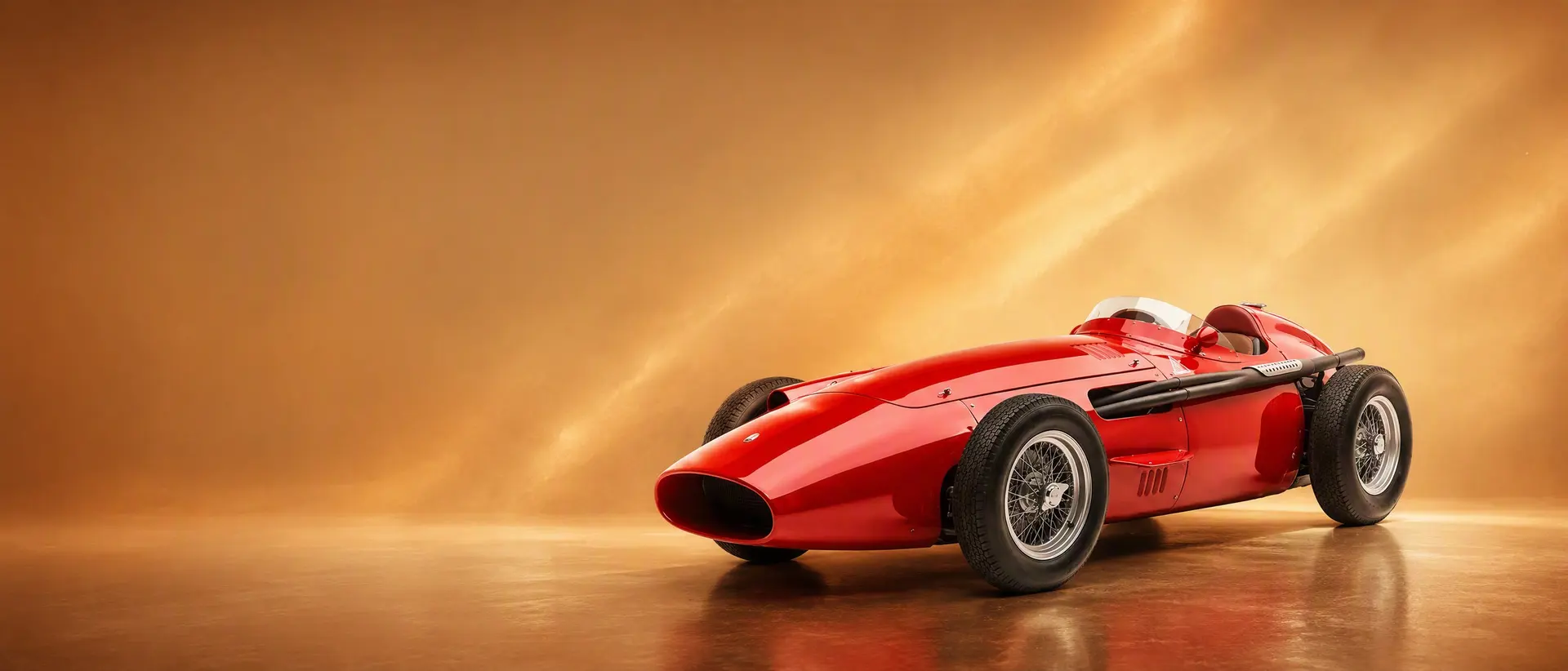 Maserati 250F staged in a darkened scene