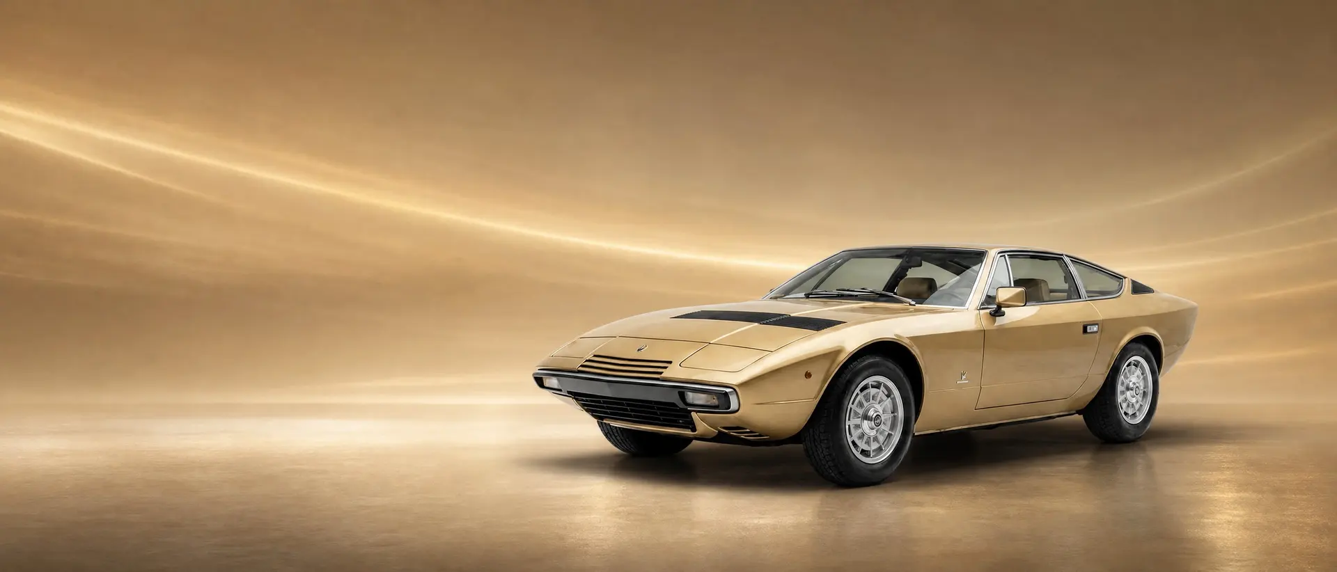 Maserati Khamsin staged in a darkened scene