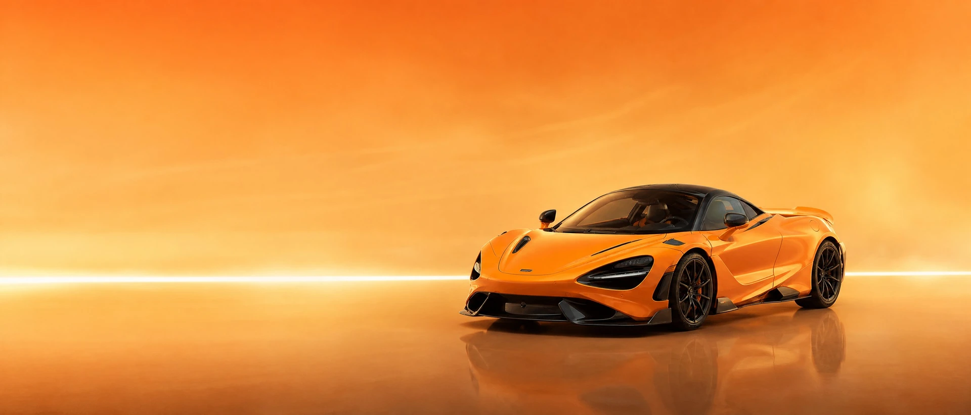 An orange McLaren 765LT, front three-quarter view on a papaya-to-cream field with a taut line of light