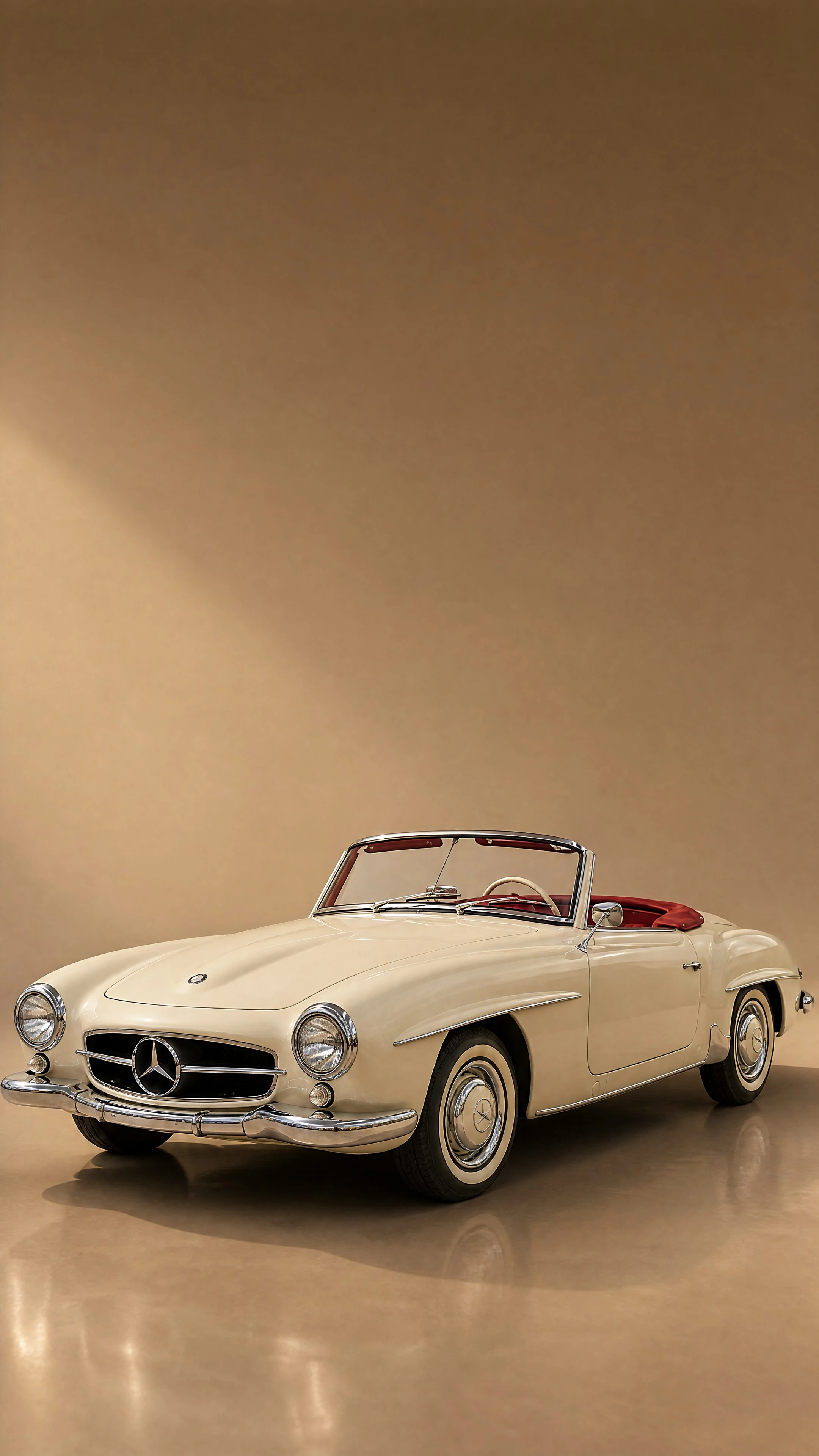 A light-ivory Mercedes-Benz 190 SL roadster with red leather, top down, on a warm champagne-taupe field in late-afternoon light