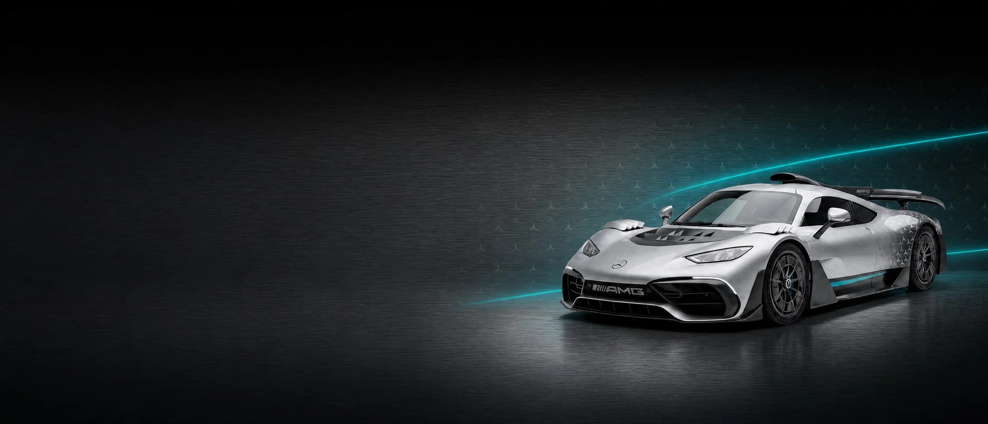 A silver Mercedes-AMG ONE, front three-quarter view on a brushed silver field with teal light lines