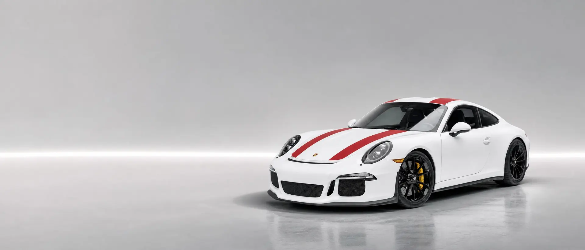 Porsche 911 R staged in a darkened scene