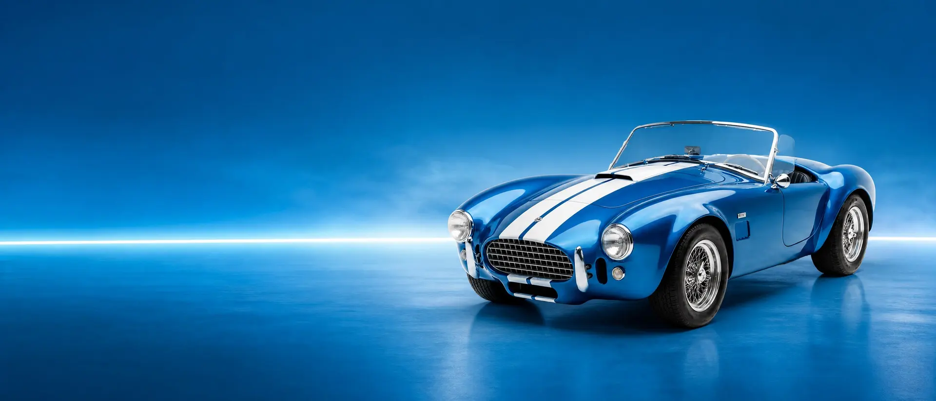 Shelby Cobra 289 staged in a darkened scene