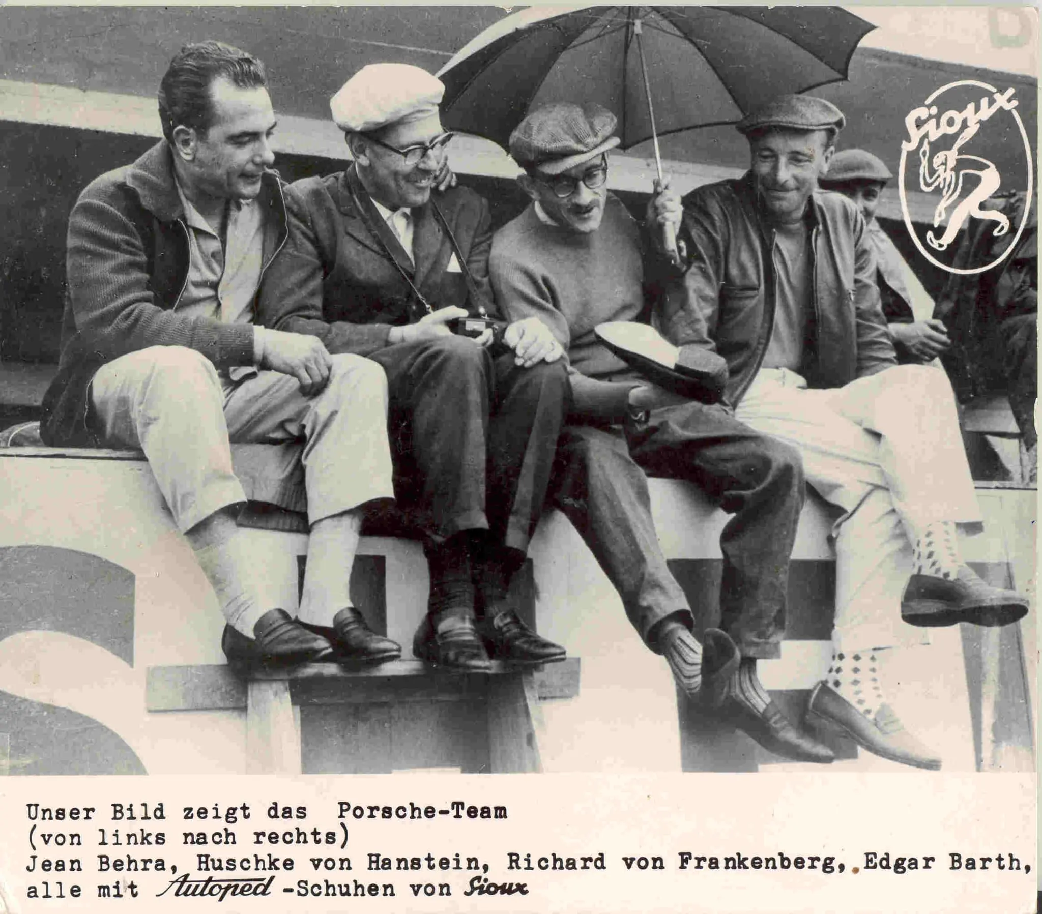 The Porsche works team on a fence: Jean Behra, Huschke von Hanstein, Richard von Frankenberg and Edgar Barth, in a Sioux shoes advertisement