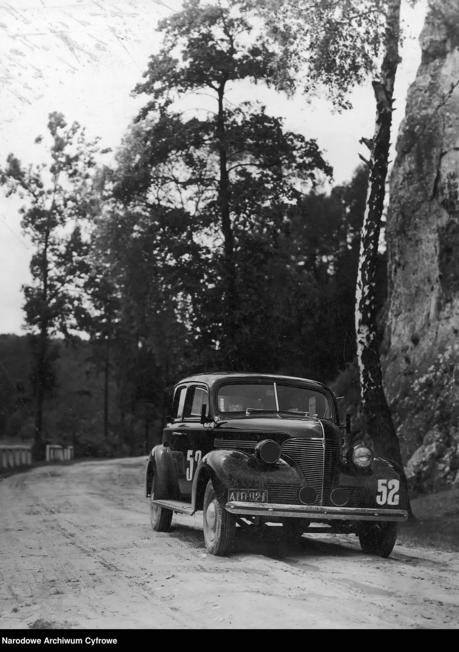 Tadeusz Marek standing beside the Chevrolet he drove to a class win at the 1939 Rally Poland