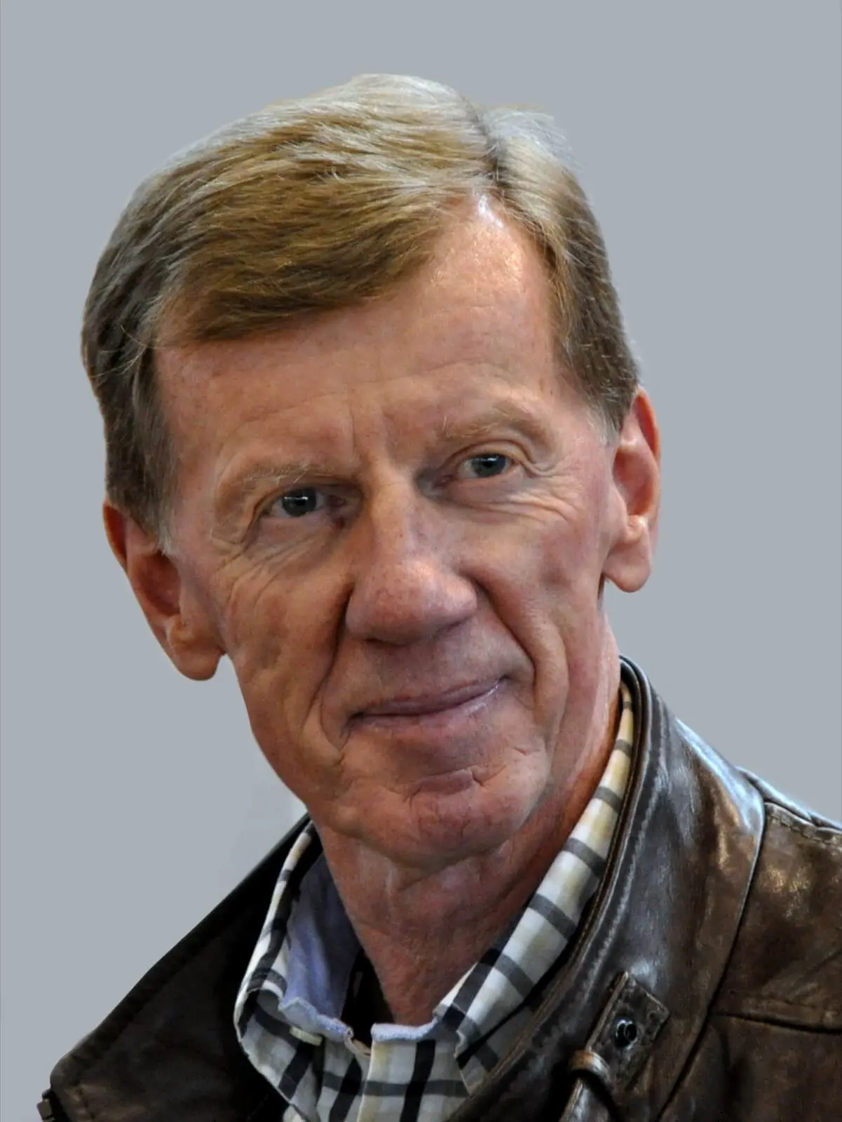 Portrait photograph of Walter Röhrl.